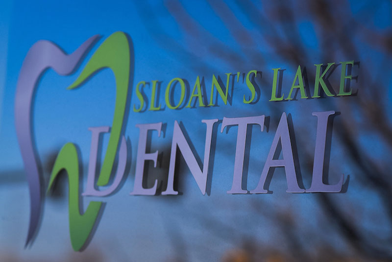 sloan dental logo door