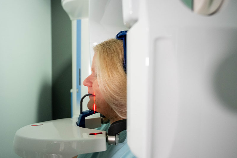 Patient taking a dental x-ray